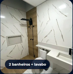 Banheiro com acabamento em mármore e louças modernas